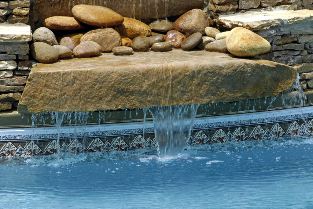 Types of Pool Waterfalls You Could Install - Admiral Pools